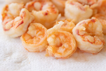 peeled fried prawns isolated on white background close up