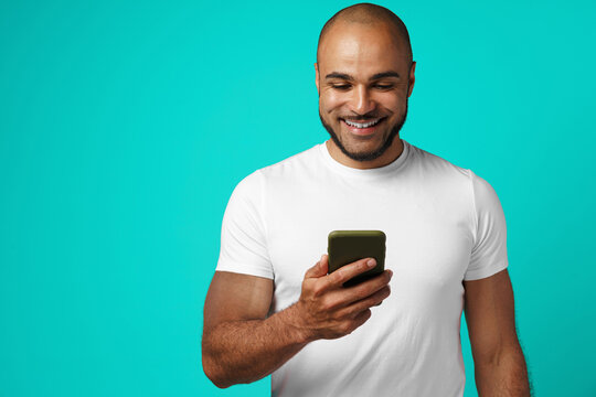 Young african american man making video call with his smartphone
