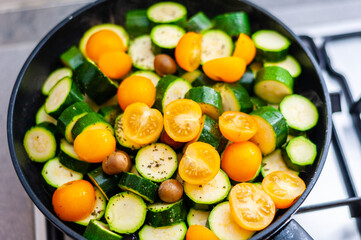 vegetarian dish, italian food cooked vegetables, tomatoes, courgettes, olives, oregano, mediterranean diet