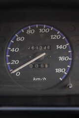 Close-up of a dashboard display sensor, on-board computer, speedometer with a blue line around the...