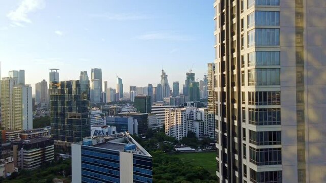 Jakarta city motion timelapse evening to night.  Big city life and business industry.