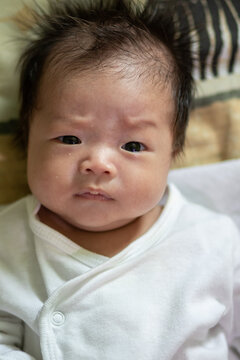 Asia Chinese Baby newborn on the bed, New family and baby healthy concept
