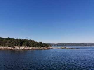 lake and mountains with trees