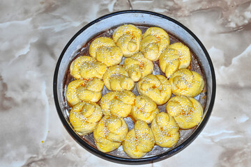 top view of traditional bread from the Balkan region ready for the oven	