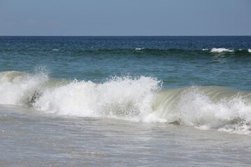 Waves crashing to shore