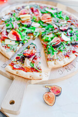 Italian Prosciutto Fig Pizza close up slice