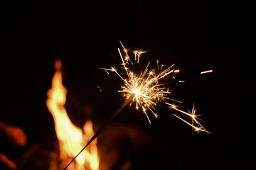 Sparkler At Campfire