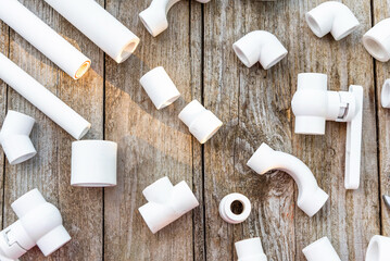 Plastic pipes, corners, fasteners, taps. Polypropylene parts for water supply.