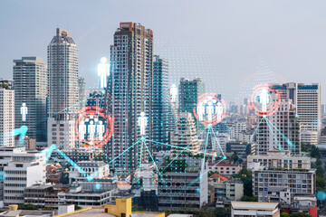 Fototapeta na wymiar Social media icons hologram over panorama city view of Bangkok, Asia. The concept of people networking and connections. Double exposure.