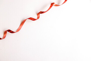 Red ribbon for gift wrapping. Decor for the holidays.