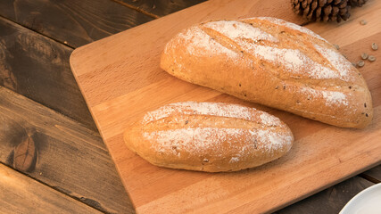 ฺBread on table and wood butcher.