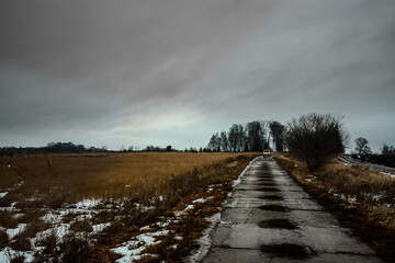 Rural concrete road in winter