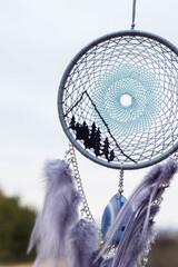 Handmade dream catcher with feathers threads and beads rope hanging