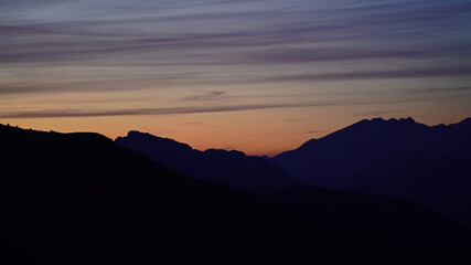 beautiful colorful sunset on the mountains with view to the alps