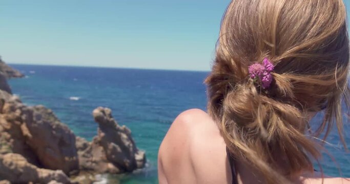 Woman watching Mediterranean Sea