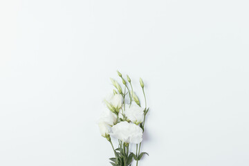 Bunch fresh Lisianthus flowers with green leaves