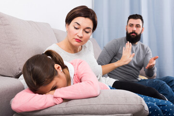 Father telling off his wife and daughter for disobedience at home
