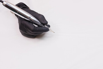 Eyebrow correction procedure tools. Pencil for permanent makeup in female hand. Instruments for...