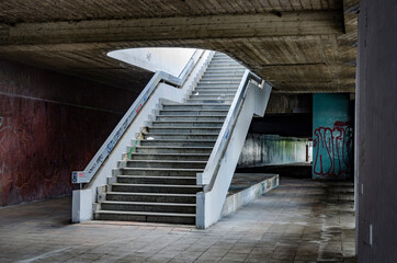 Dirty urban passage with damaged stairway