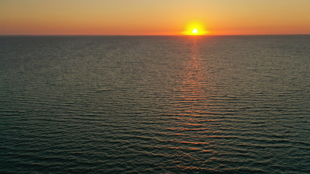 Beautiful sunrise over the horizon. aerial photography. sunrise in the ocean