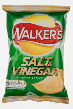London, England - October 26, 2011: Packet of Walkers Salt and Vinegar Crisps, Walkers is a british food company founded in 1948.