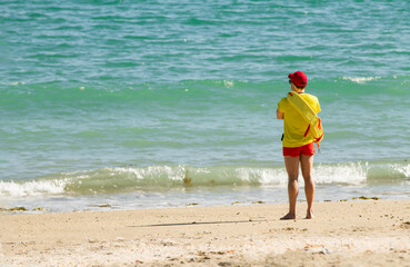 lifeguard on the beach, a lifesaver watching the sea