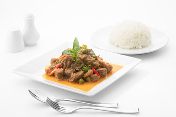 Close up view of fried beef with vegetables on white back 