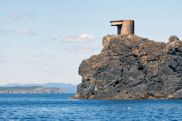 Old abandoned soviet fortification on Bolshoy (Big) Pelis island. Far Eastern State Marine Reserve,...