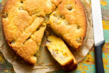 Sticky gooseberry saffron cake with vanilla custard