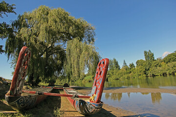 A traditional boat, hand made and carved by the native people of New Zealand: the Moari. The...