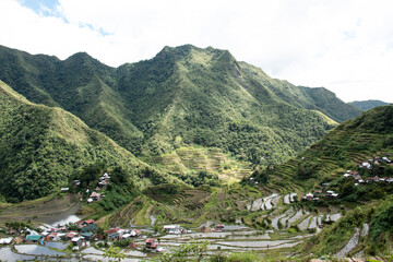 Fototapeta na wymiar The Batad village cluster-part of the Rice Terraces of the Philippine Cordilleras UNESCO World Heritage Site in the cultural landscape category. Banaue-Ifugao province-Cordillera region-Luzon island.