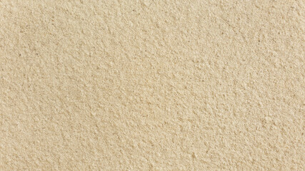 beige color spray texture painted wall. special spray paint to create texture for architecture. abstract sandy background.  