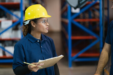 industrial worker in factory, worker man working in warehouse stock checking. suppervisor team...