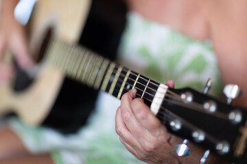 Fototapeta premium Woman Playing Ccoustic Guitar Abstract.