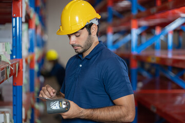 industrial worker in factory, worker man working in warehouse stock checking. suppervisor team control and management