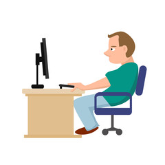 A man works at a computer, he sits at a table.