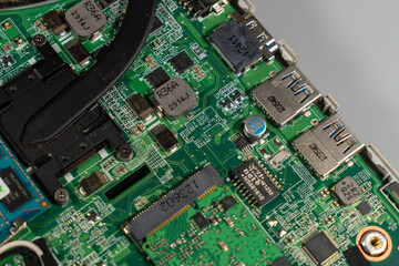 Part of the laptop motherboard with a heatsink for the processor