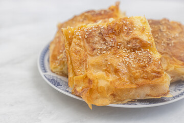 Serbian cheese pie Gibanica served on the plate
