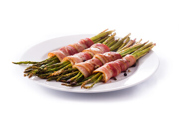 Green asparagus wrapped with bacon isolated on white background