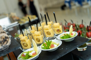 Festive buffet table with many snacks and appetizers