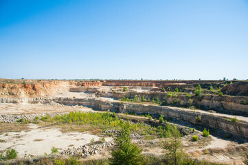 Fototapeta na wymiar Production of stone at a forsaken quarry
