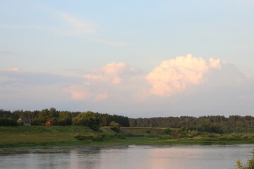 Sunny evening on the river in the countryside