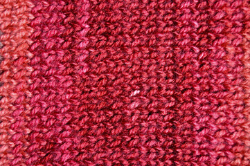 Handmade knitted fabric red wool background texture