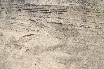 Mud, dried puddles on a sandy road