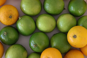 Beautiful lemons and oranges arranged on a table. A fruit rich in vitamin c.