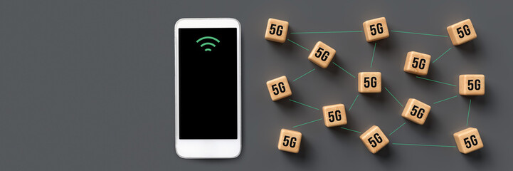 cubes with 5G symbol and a smartphone on grey background