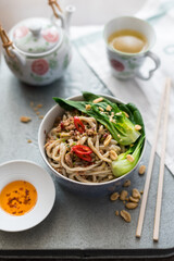 Chinese Udon Noodles with Minced Pork in Spicy Sauce Served with Pak Choi