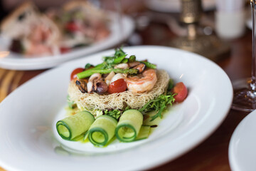 Seafood Crispy Noodles. Asian Crispy Noodles with Prawns, Mussels, Octopus and Fresh Vegetables