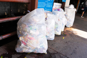 Trash bags at a boat station in Bangkok. Cleanliness in public areas