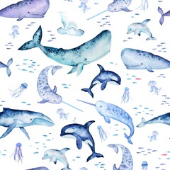 Watercolor pattern with marine mammals. Cute whales, narwhals, dolphins, fish and jellyfish on white. Colorfull seamless background for textile, wallpapers, print and banners.